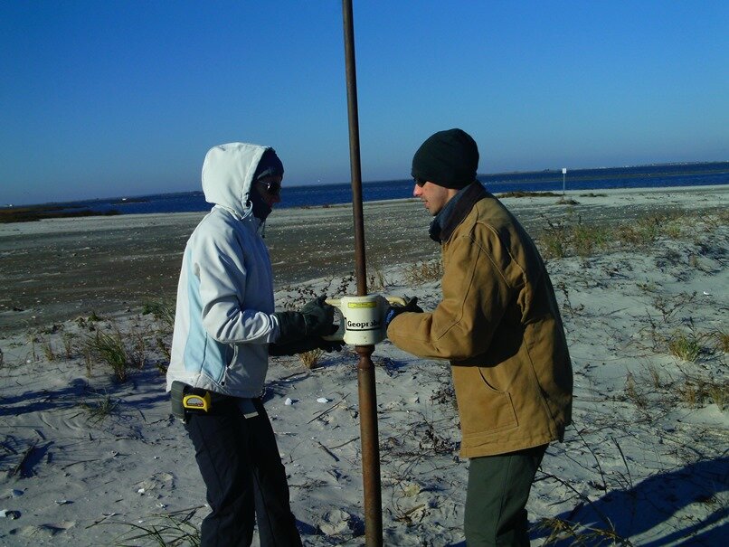 Chris Hein and Laura Rogers collecting a handheld Geoprobe sediment core on Long Beach Island, NJ, in November 2014.